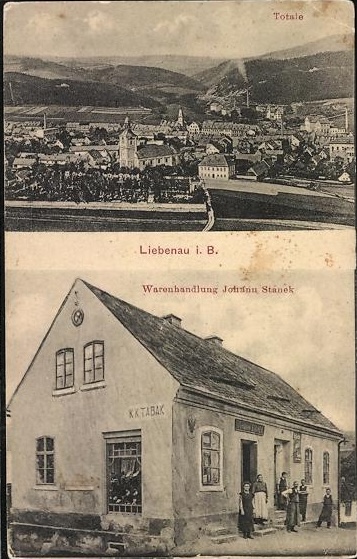 AK-Liebenau-i-B-Warenhandlung-Johann-Stanek-Ortsansicht-mit-Kirche.jpg