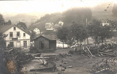Foto-AK-Dessendorf-Dammbruch-1916-Schwemmholz-im-Ort.jpg